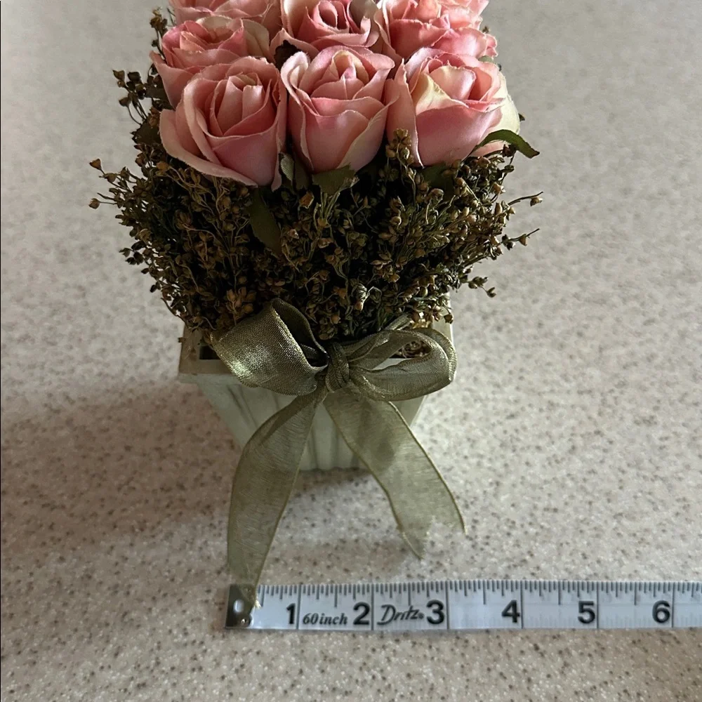 Decorative Floral Arrangement Pink Roses in a green planter box